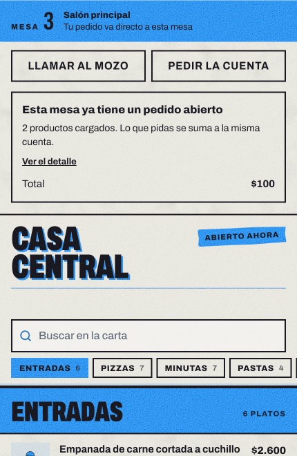 La carta en el celular con la franja Mesa 3, los botones Llamar al mozo y Pedir la cuenta, y la tarjeta Esta mesa ya tiene un pedido abierto con su total